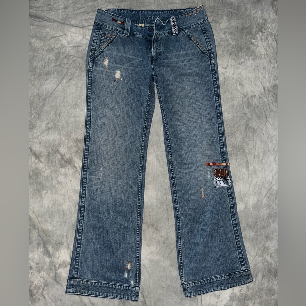 Free People Size 30 denim jeans with patchwork and embellishments